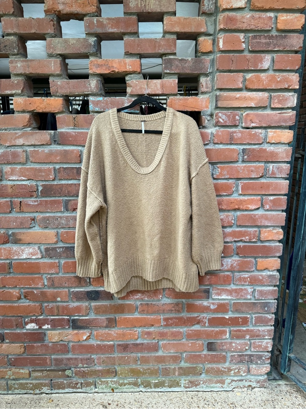 Free People Relaxed V-Neck Sweater in Camel Tan